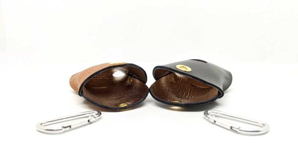 Coppia porta sacchetti per cani ideato da toscani store distesi aperti